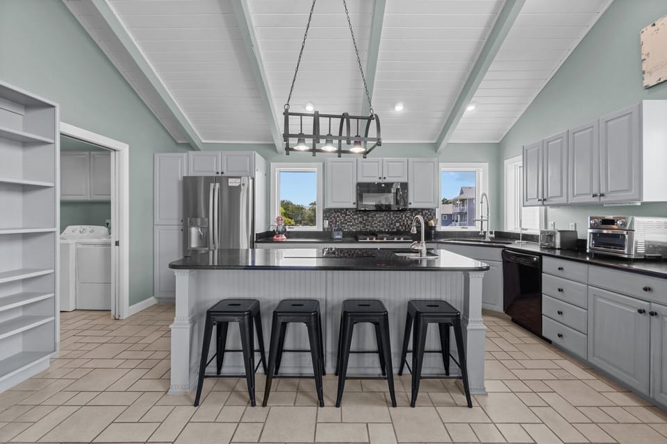 Whip up something delicious in the Kitchen with modern appliances and beautiful decor.