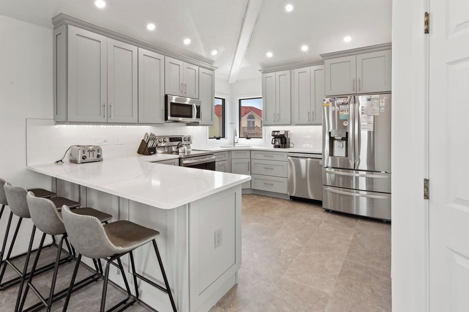 The pristine Kitchen is ideal for whipping up a great meal to enjoy together.