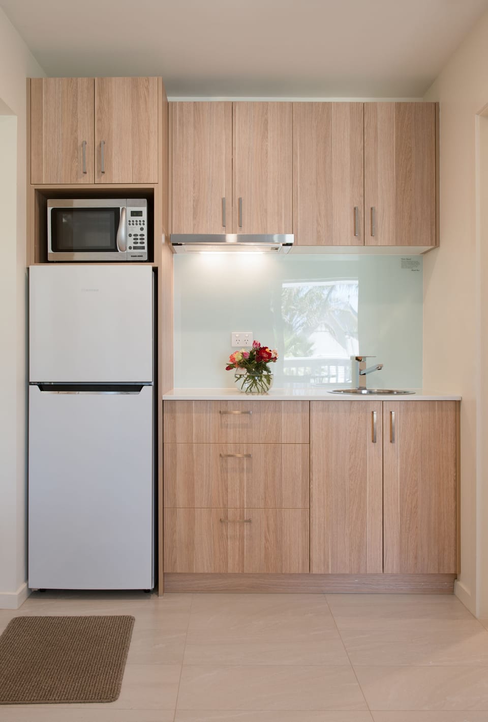 Espresso maker, coffee/tea maker, full-size fridge, microwave