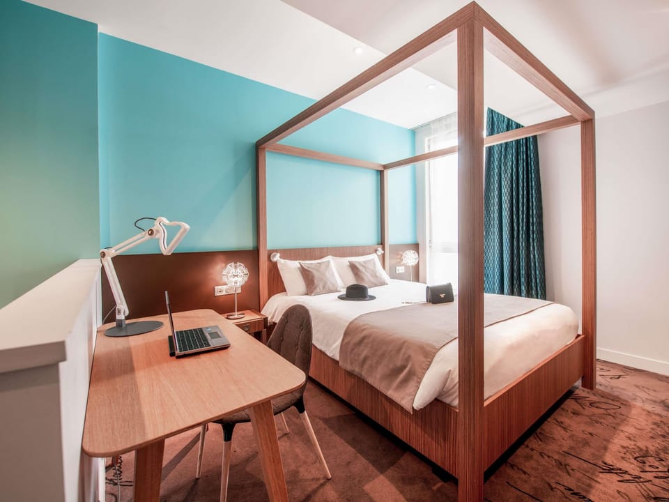 Premium bedding, blackout drapes, soundproofing, iron/ironing board