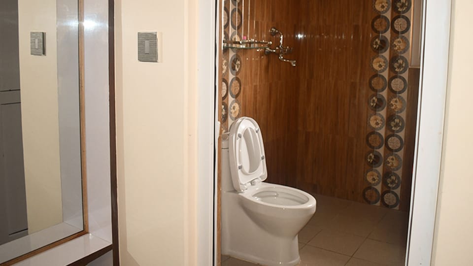 Shower, rainfall showerhead, slippers, towels