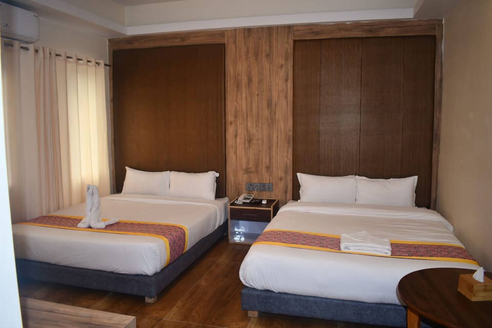 Family Room | Premium bedding, individually decorated, individually furnished, desk