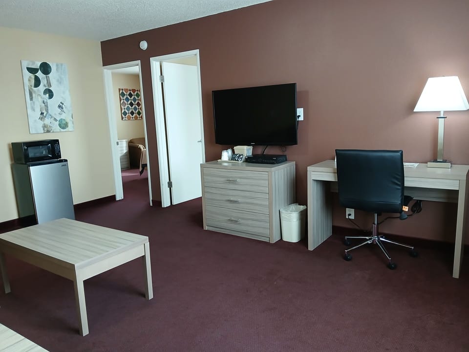 Suite, 2 Bedrooms (with Living Area) | Iron/ironing board, free WiFi, bed sheets, alarm clocks
