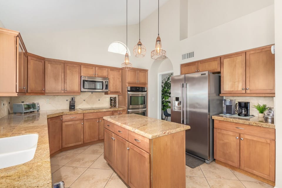 well-appointed kitchen w/ SS appliances and ample counter space