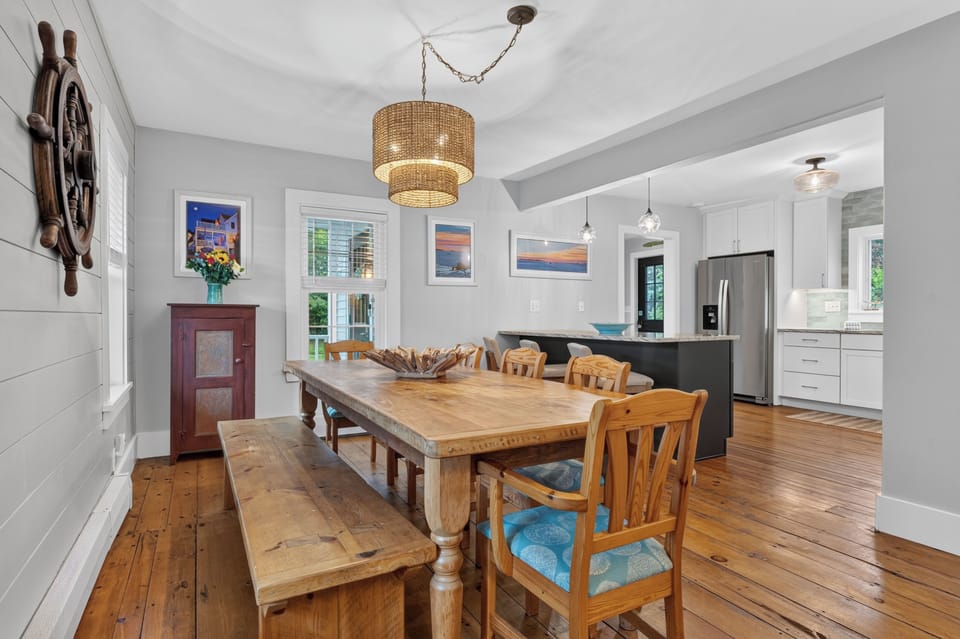 Updated kitchen and dining room with large table and breakfast bar