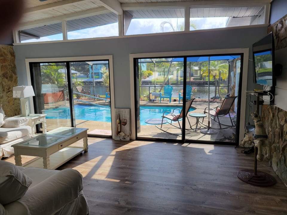 Living room open to pool 