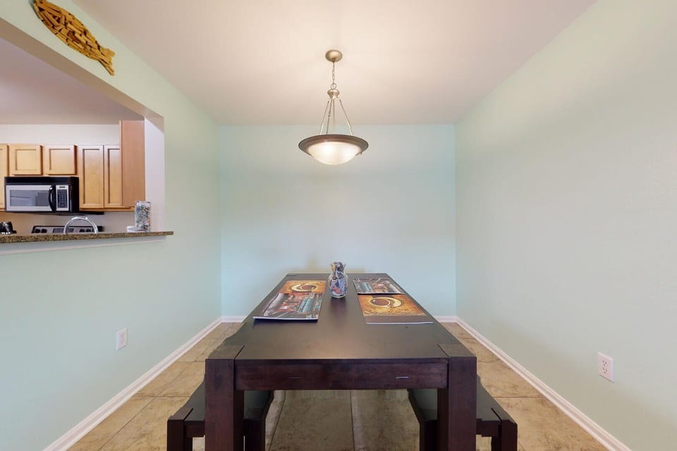 Gather round the dining table, comfortably seating six, for memorable meals and shared moments with loved ones.