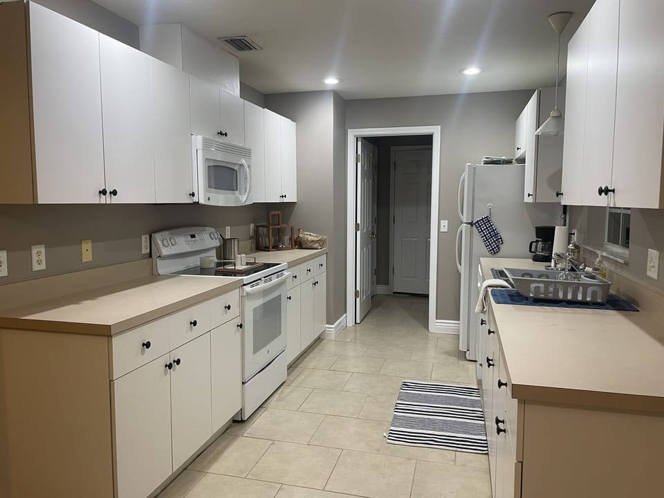 Kitchen to Laundry Room and Garage