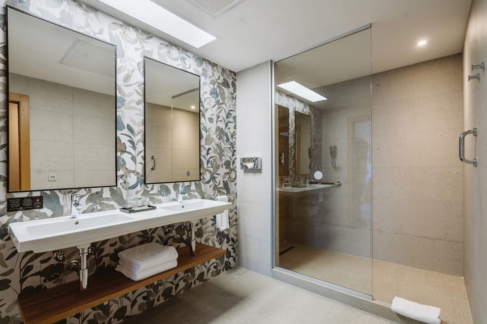Shower, rainfall showerhead, eco-friendly toiletries, hair dryer