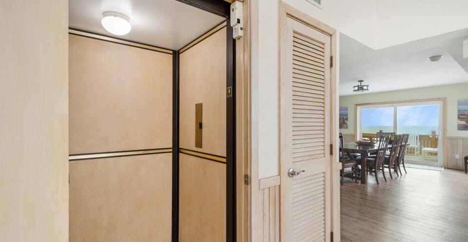 The elevator easily transports groceries, luggage, and people between 3 of the home's levels.