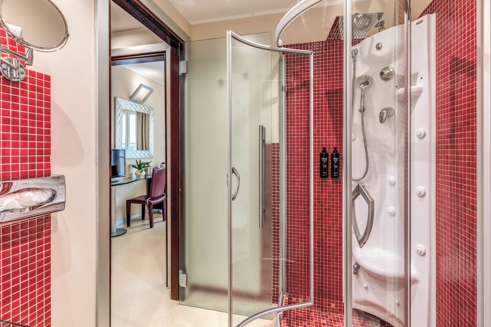 Eco-friendly toiletries, hair dryer, slippers, bidet