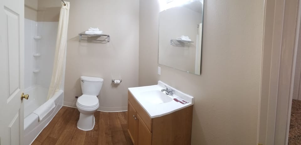 Bathtub, hair dryer, towels