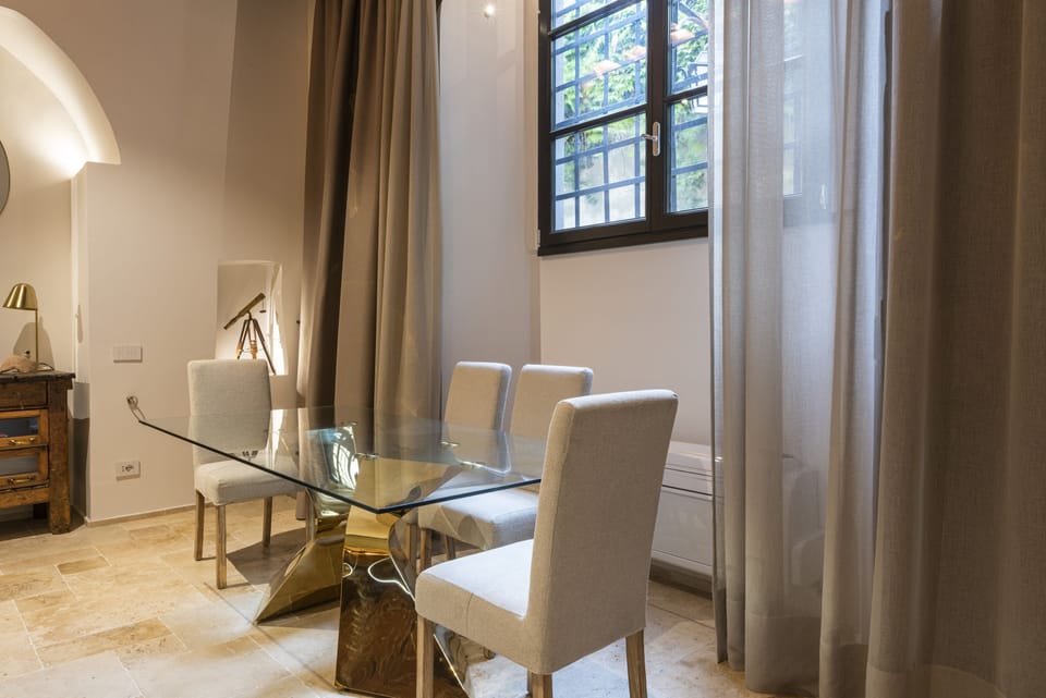 Deluxe Apartment | Living area | Flat-screen TV
