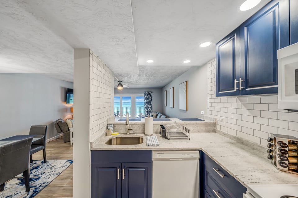 The recently updated kitchen features quartz countertops and has everything you need to prepare meals for family & friends.