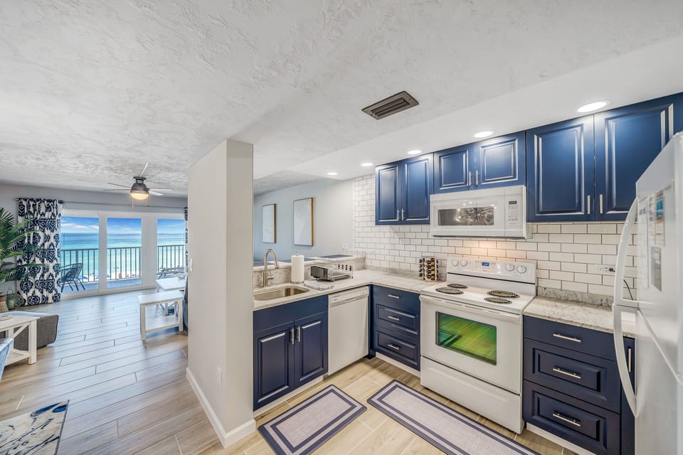 The recently updated kitchen features quartz countertops and has everything you need to prepare meals for family & friends.