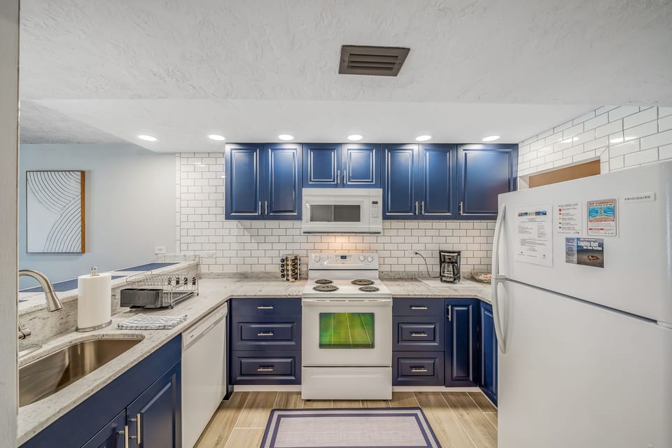 The recently updated kitchen features quartz countertops and has everything you need to prepare meals for family & friends.