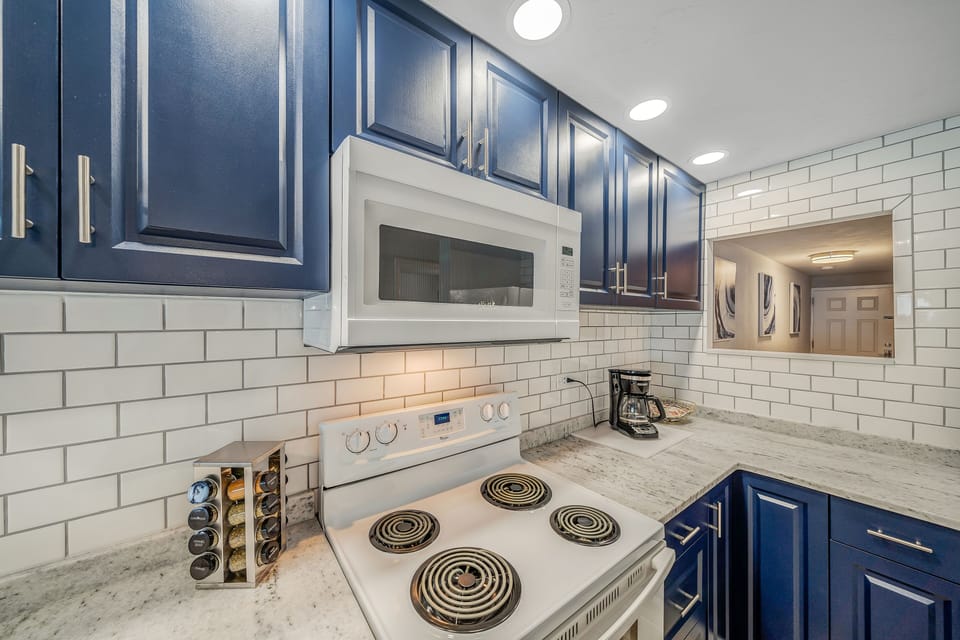 The recently updated kitchen features quartz countertops and has everything you need to prepare meals for family & friends.