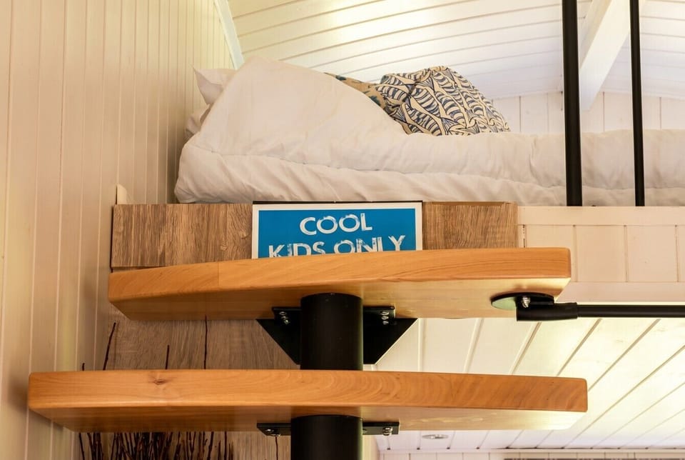 The upstairs den is pure kids` territory, even with a push along buggy for the ride.