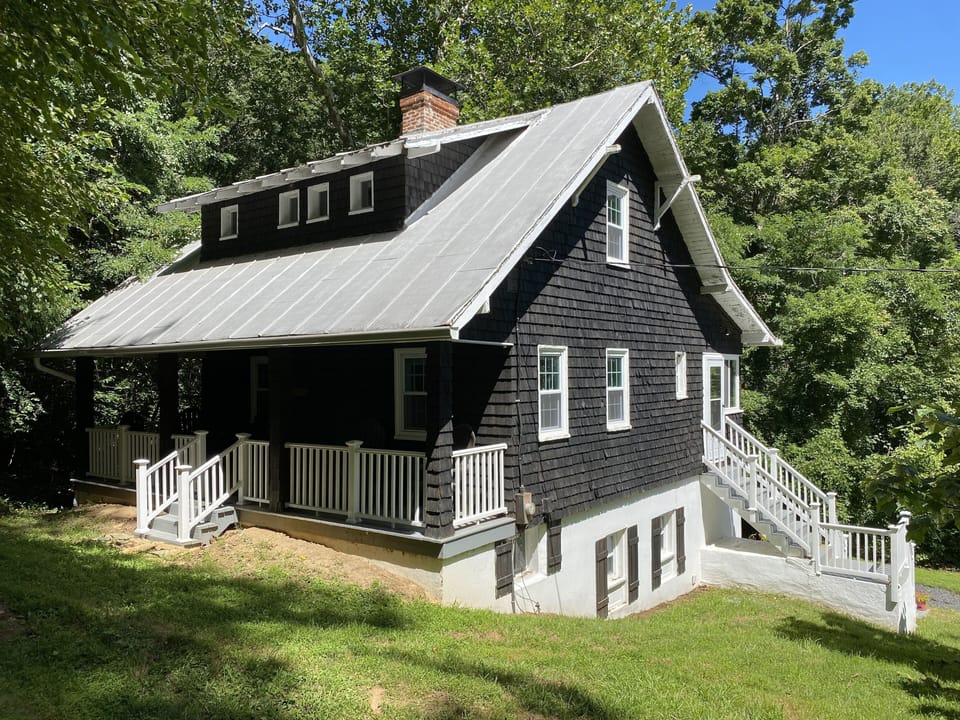 The three story house has been historically renovated with modern conveniences.