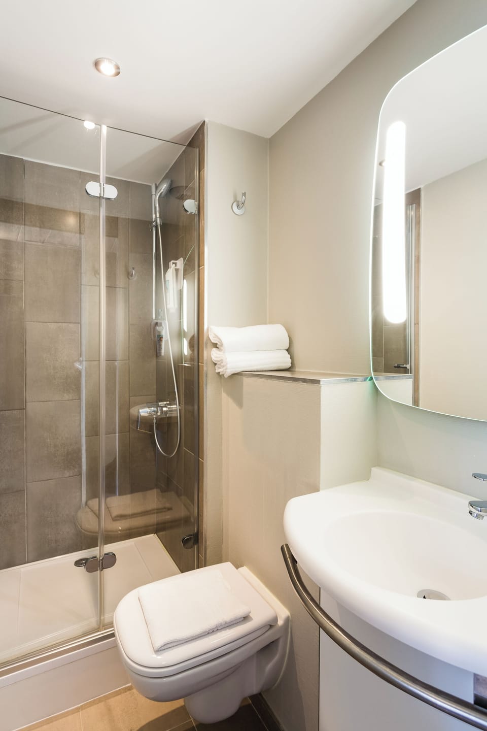 Shower, eco-friendly toiletries, hair dryer, towels