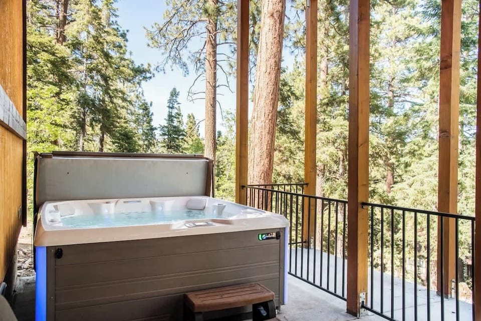 JACUZZI TUB AT BOTTOM OF THE STAIRS IN THE BACK OF THE HOME