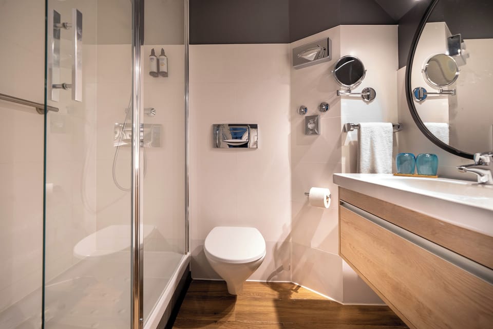 Shower, eco-friendly toiletries, hair dryer, towels