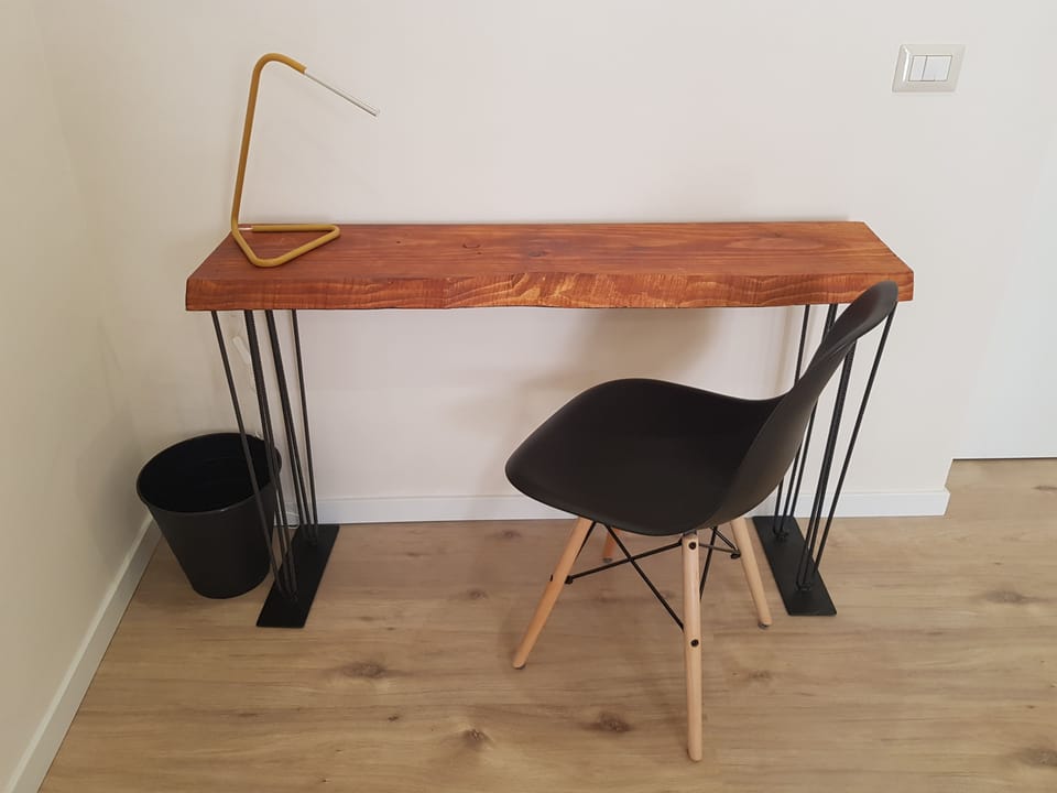 Desk, blackout drapes, rollaway beds (surcharge), WiFi (free)