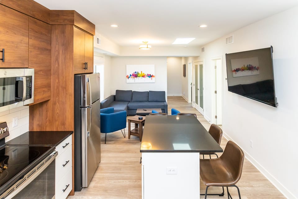 Open kitchen and living room floorplan 65" TV with YouTube TV and Amazon Prime