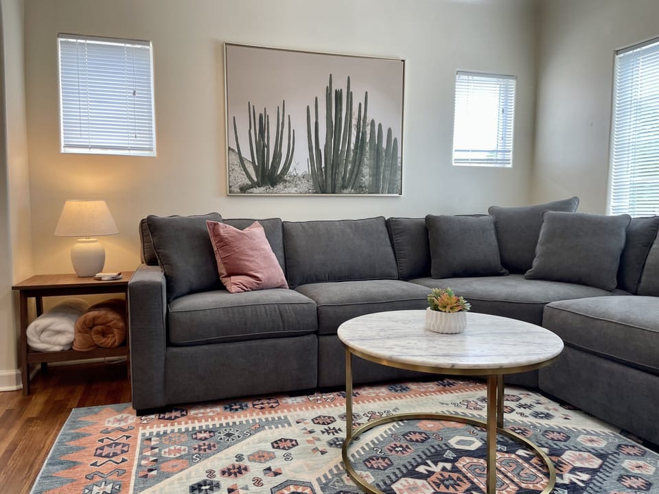 New sectional sofa (SO comfortable) and soft throws.