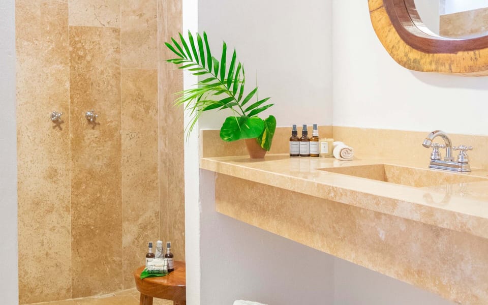 Shower, designer toiletries, hair dryer, bathrobes
