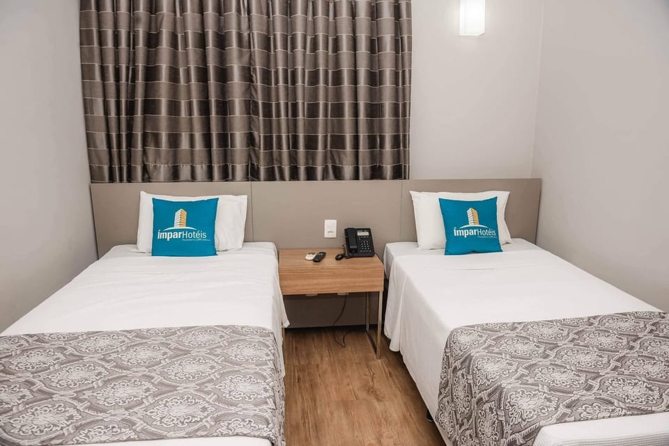 Standard Single Room | 1 bedroom, minibar, in-room safe, desk