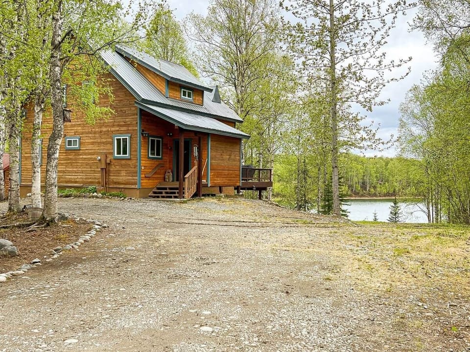 Main view of the house from the road overlooking the lake! 
