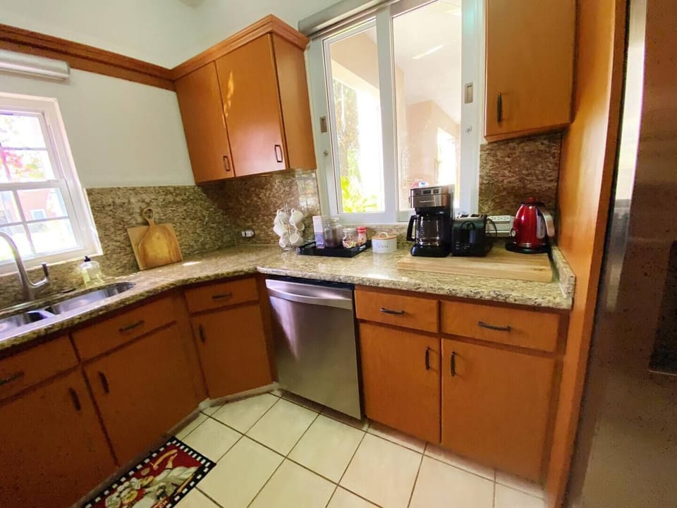 The kitchen is equipped with modern appliances