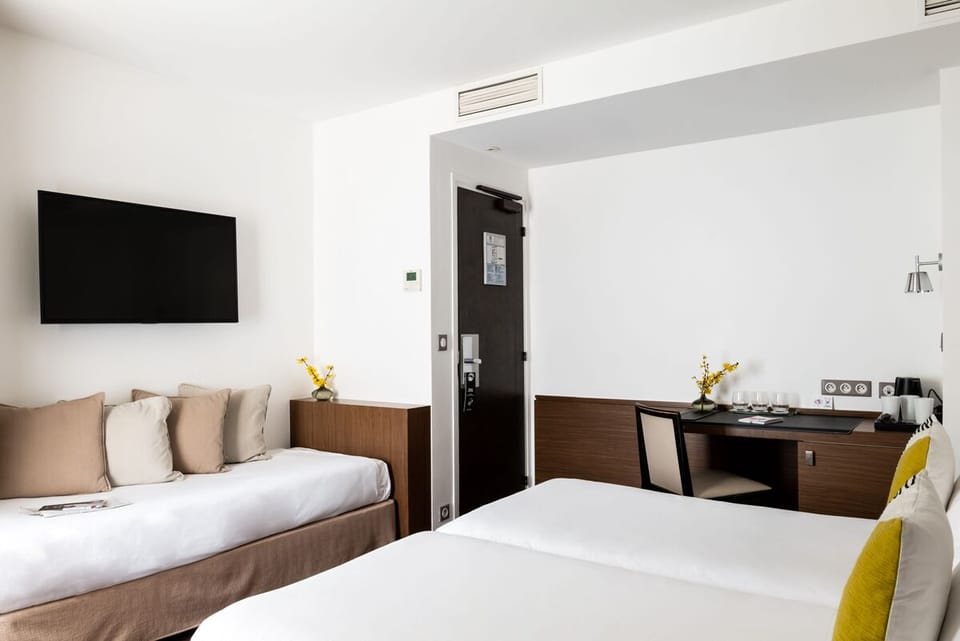 Triple Room | Free minibar items, in-room safe, desk, soundproofing