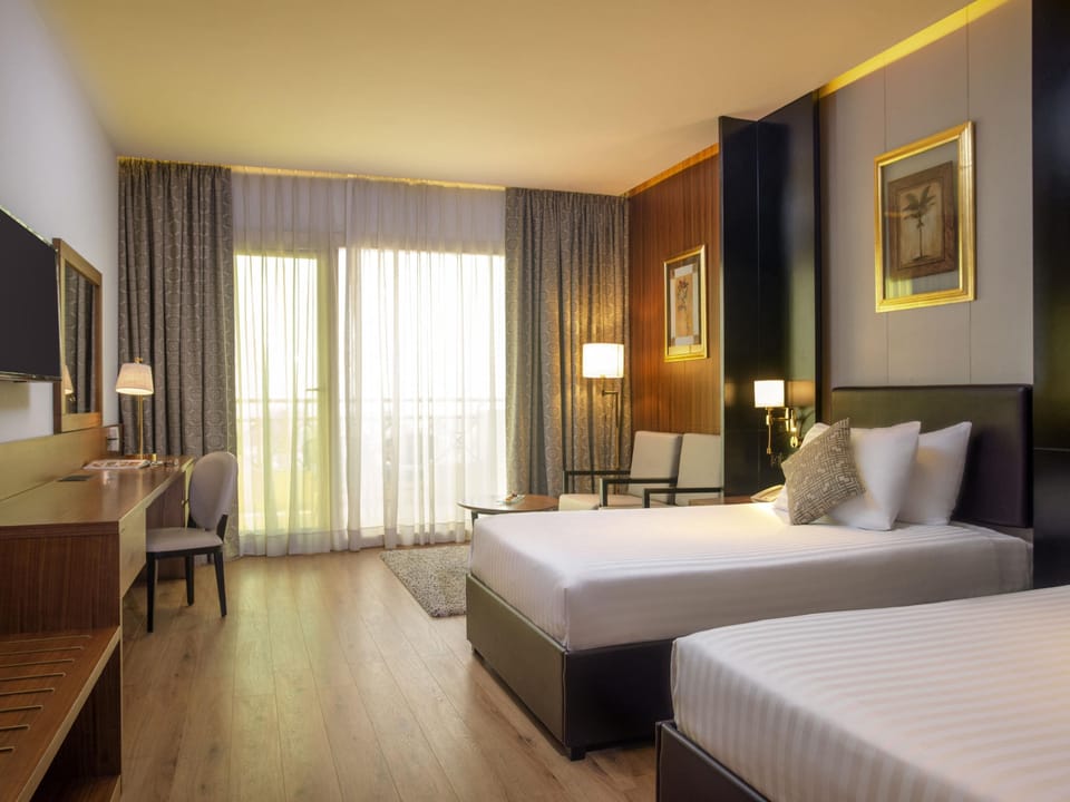 Premium bedding, memory foam beds, minibar, in-room safe