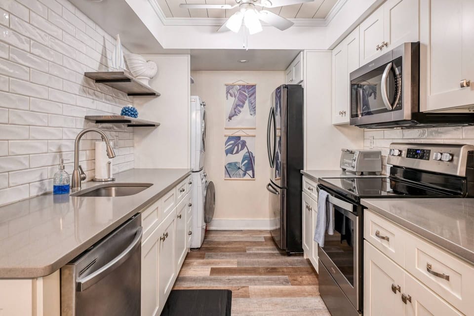 Cook your favorite meal in the kitchen with all stainless steel appliances.