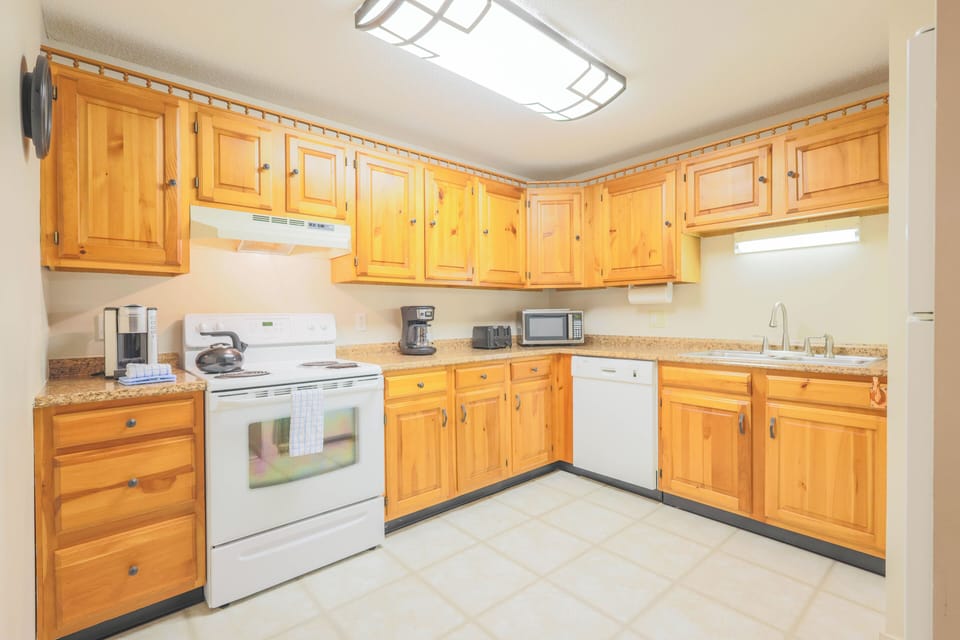 Kitchen will full size appliances dishware, flatware, glassware, cooking utensils and pots & pans.