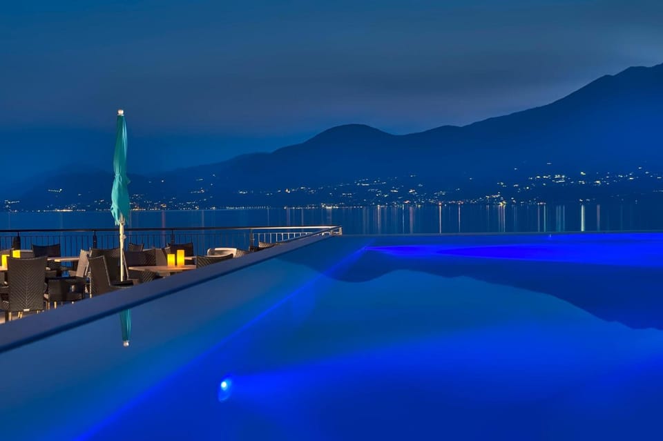 Indoor pool, seasonal outdoor pool, pool umbrellas, sun loungers