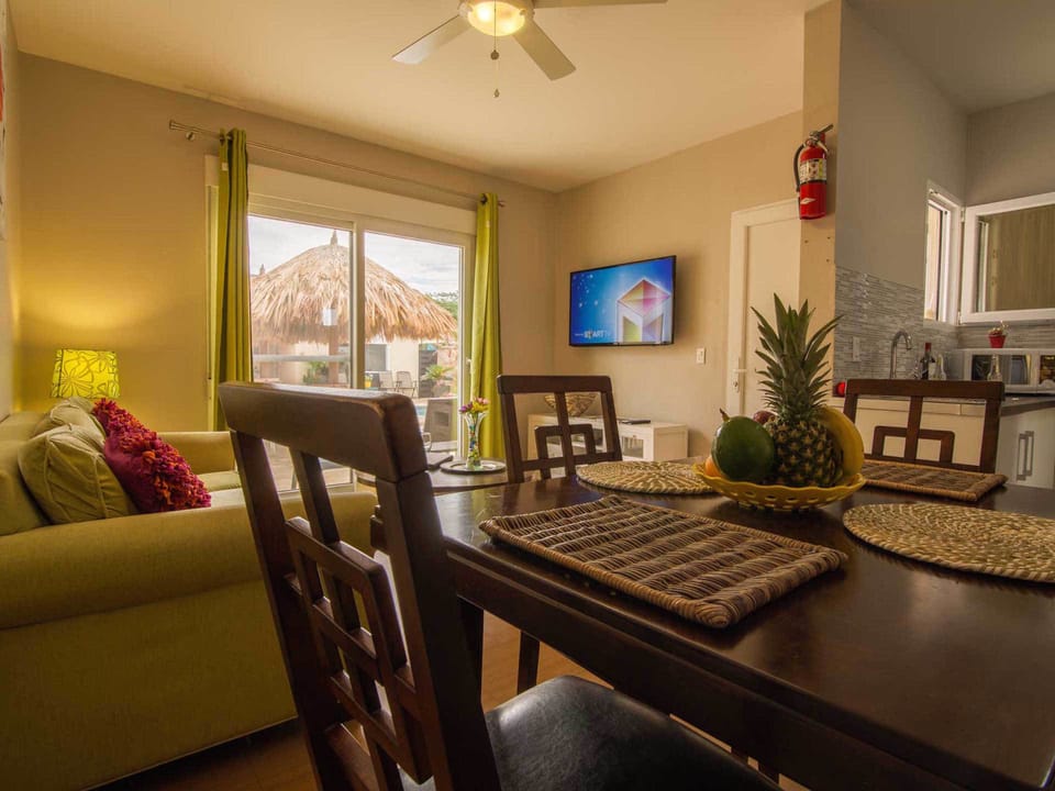 Apartment | Living area | 50-inch flat-screen TV with satellite channels, LED TV, DVD player