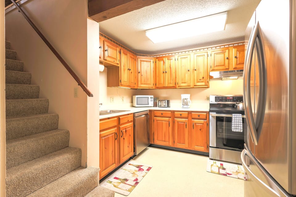 Kitchen & stairs to sleeping loft