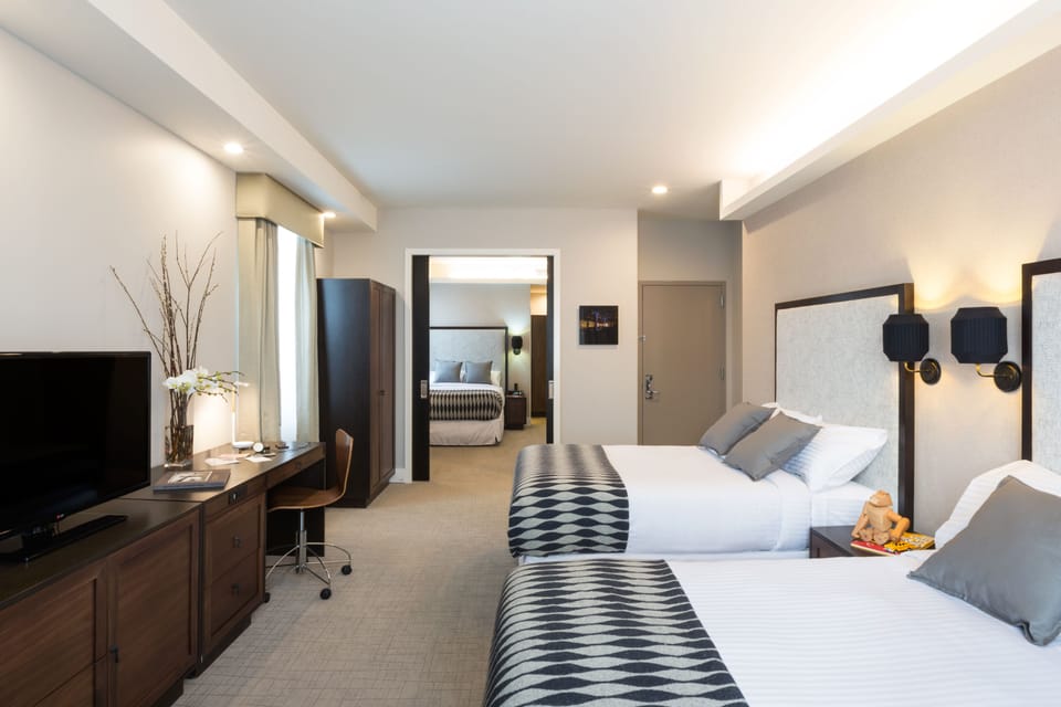 Deluxe Suite, 2 Bedrooms, City View | Premium bedding, in-room safe, desk, soundproofing
