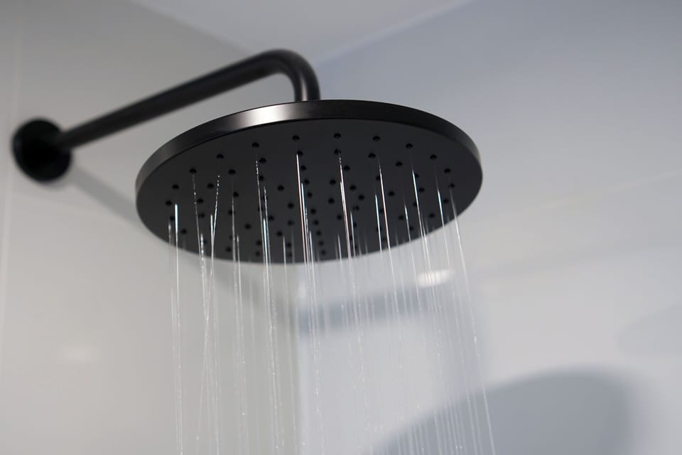 Premium Deluxe Full | Bathroom | Shower, rainfall showerhead, hair dryer, slippers