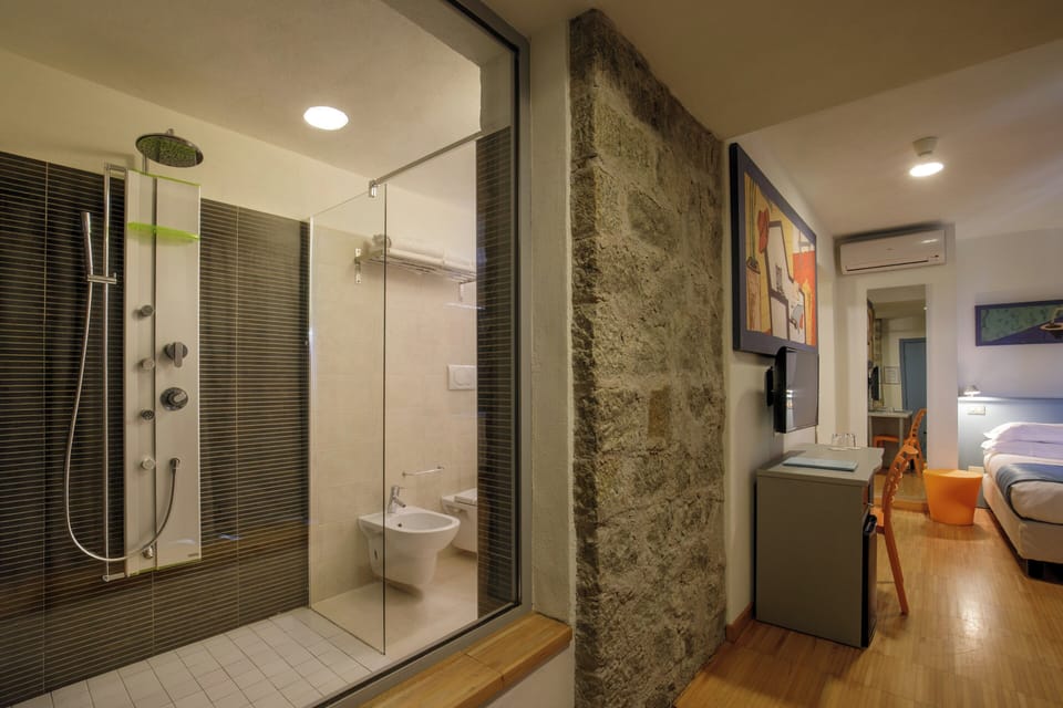 Economy Double Room, Sea View | Bathroom | Shower, free toiletries, hair dryer, towels