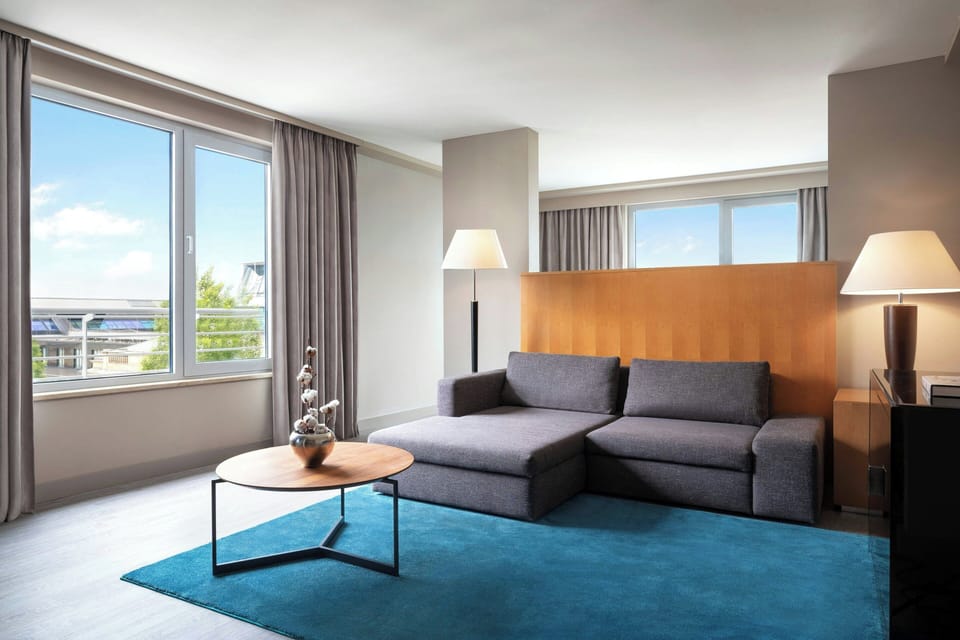 Deluxe Suite, 1 King Bed with Sofa bed | Premium bedding, down comforters, pillowtop beds, in-room safe
