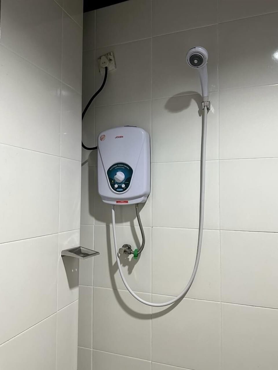 Shower, rainfall showerhead, slippers, towels