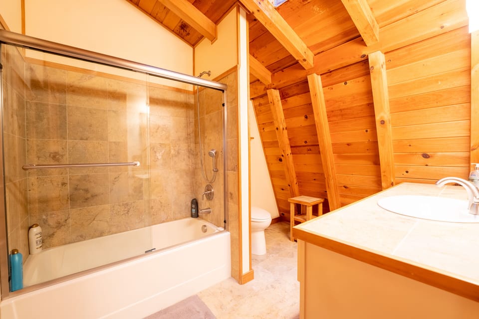 Loft bathroom with tub/ shower combo