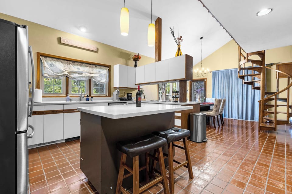 The open kitchen goes directly into the dining room.