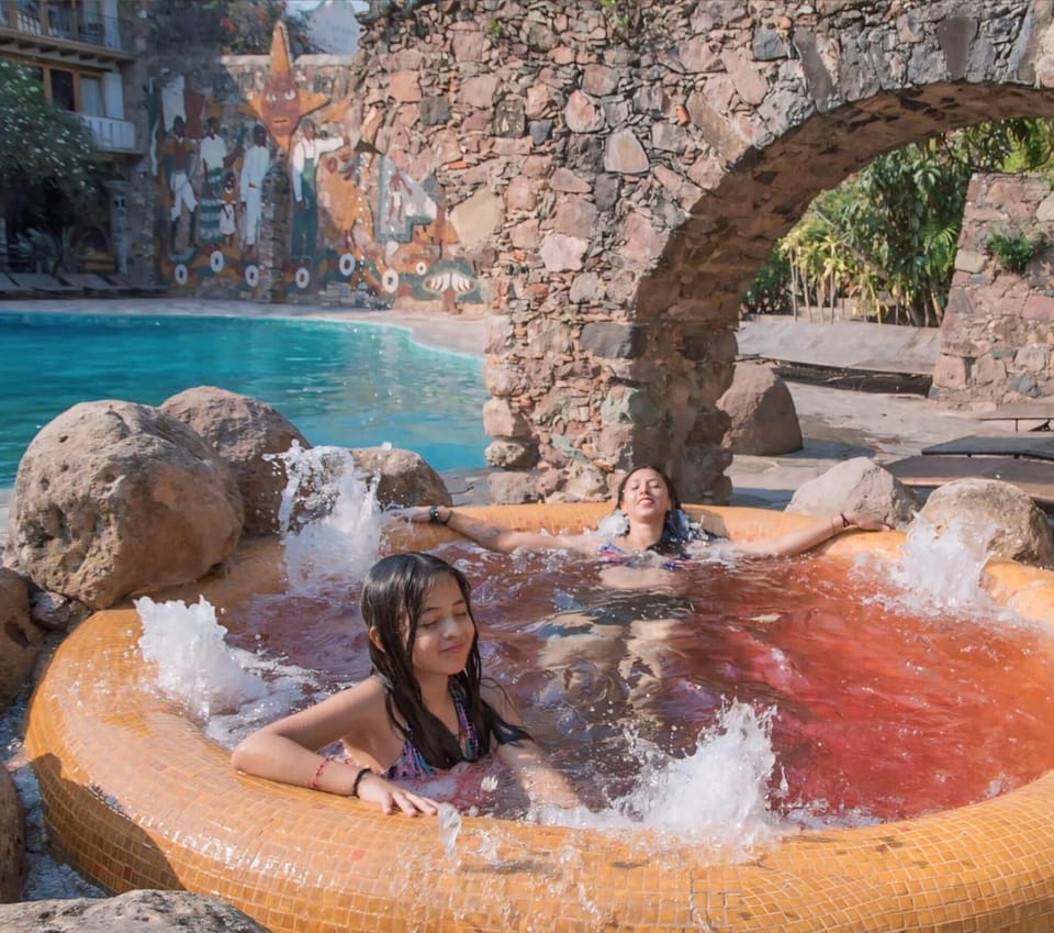 2 outdoor pools, open 9 AM to 7 PM, pool umbrellas, sun loungers