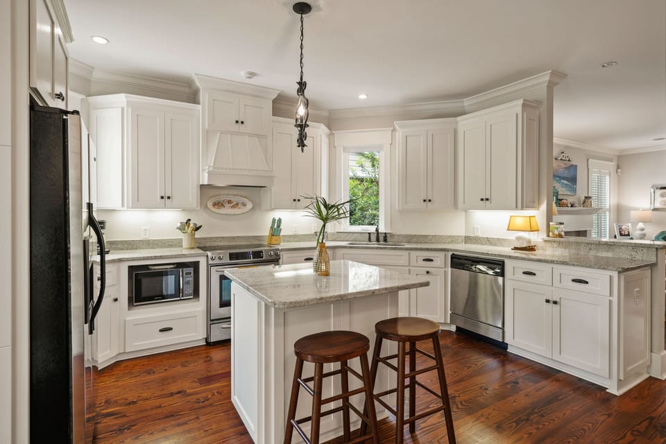 Fully stocked kitchen with coffee maker, keurig, toaster, blender, & microwave