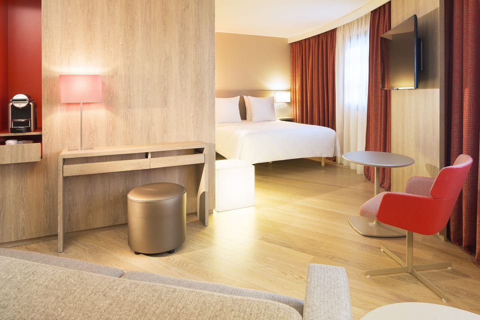Premium Room Free WiFi & Pool Access | Living area | Flat-screen TV